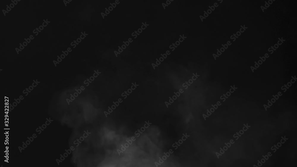 Air Flow Mixes Periodically Vapor Stream. White hot steam rises slowly on a black background. A stream of air periodically blows and mixes this stream. Filmed at a speed of 240fps Air Flow Mixes Periodically Vapor Stream. White hot steam rises slowly on a black background. A stream of air periodically blows and mixes this stream. Filmed at a speed of 240fps