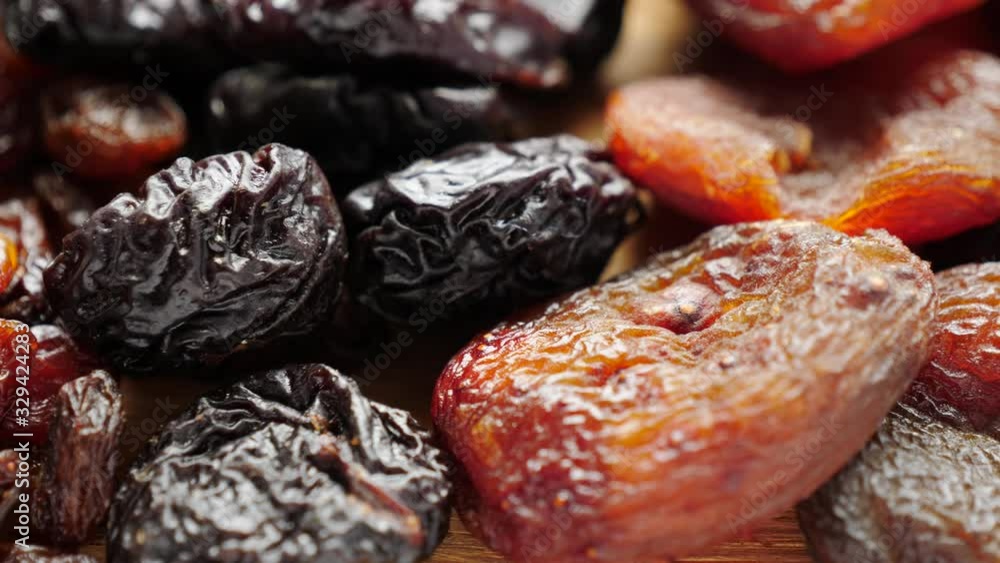 Close up of assorted dried fruits. Natural background made from different kinds of dry fruits Close up of assorted dried fruits. Natural background made from different kinds of dry fruits