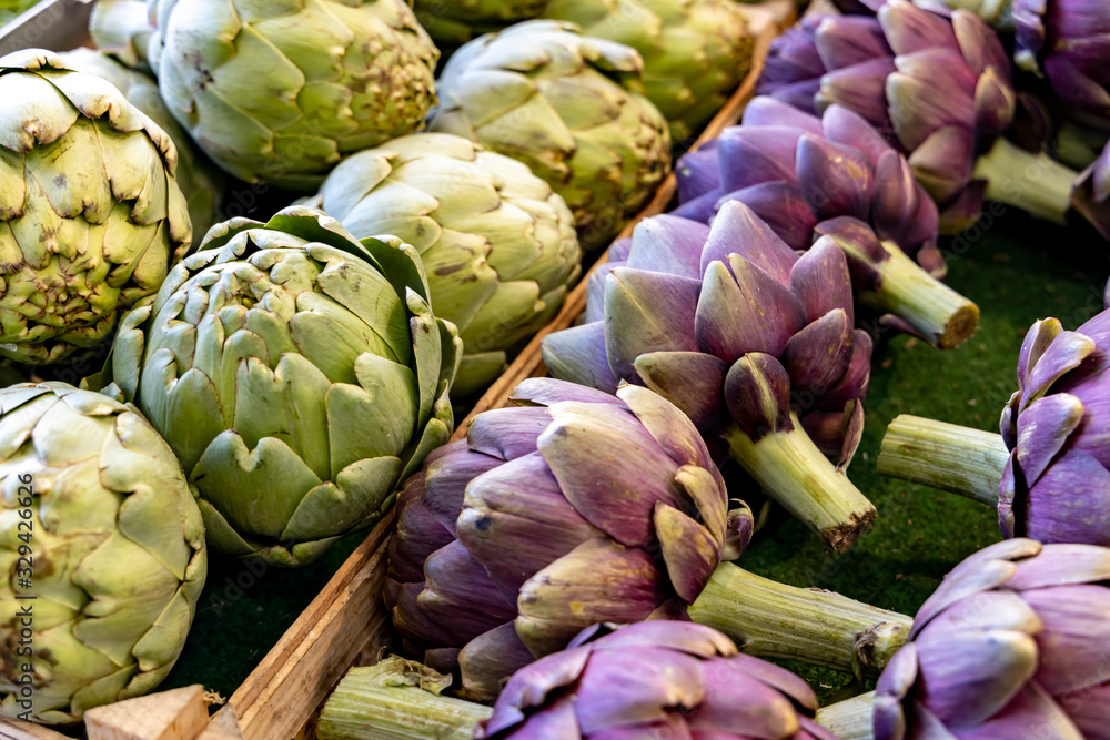 Fototapeta premium Close up of many globe artichokes.