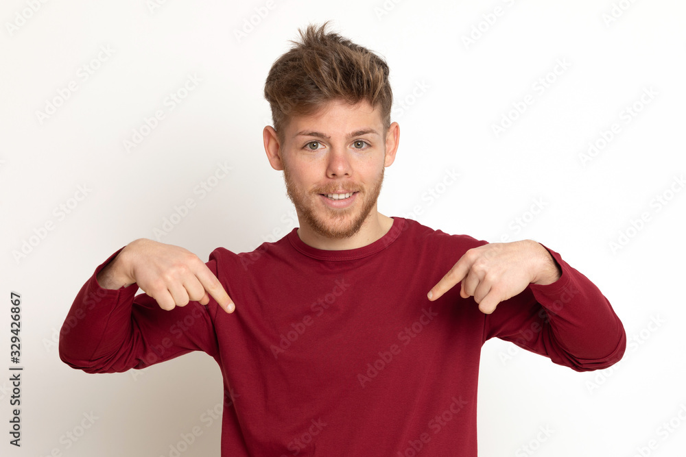 Attractive young guy with a red T-shirt Attractive young guy with a red T-shirt