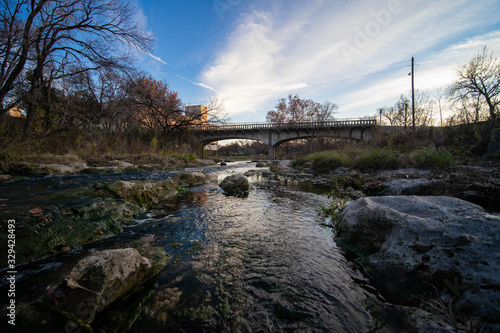 river flowing under bridge