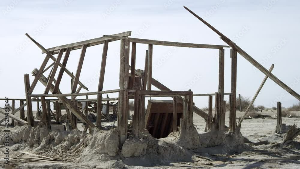 Wood Building Wreckage Sits in Dry Southwest Desert Wood Building Wreckage Sits in Dry Southwest Desert