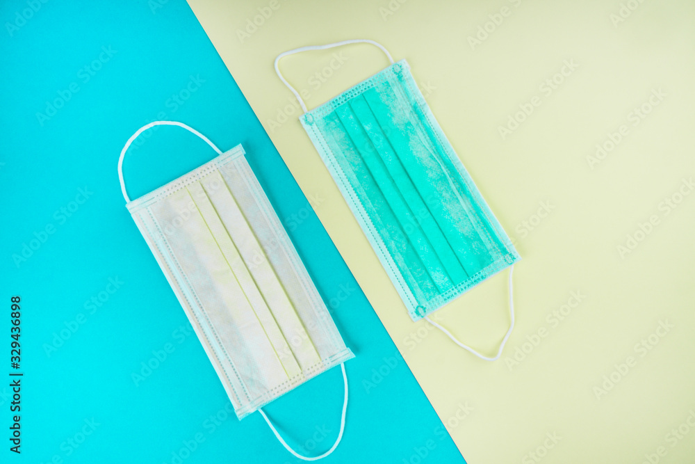 two medical surgical flu ilness protective face masks