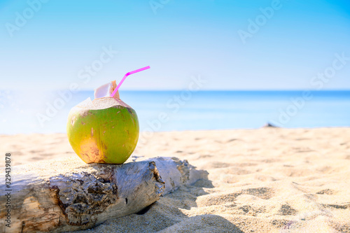 Coconut water on a tropical beach