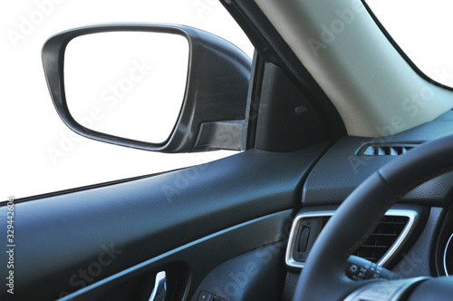 Car interior with a side-view mirror isolated on white © Dmitry Perov