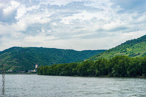 Wallpaper Mural Germany, Rhine Romantic Cruise, a large body of water with a mountain in the background Torontodigital.ca