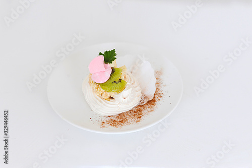 Cream dessert on white plate