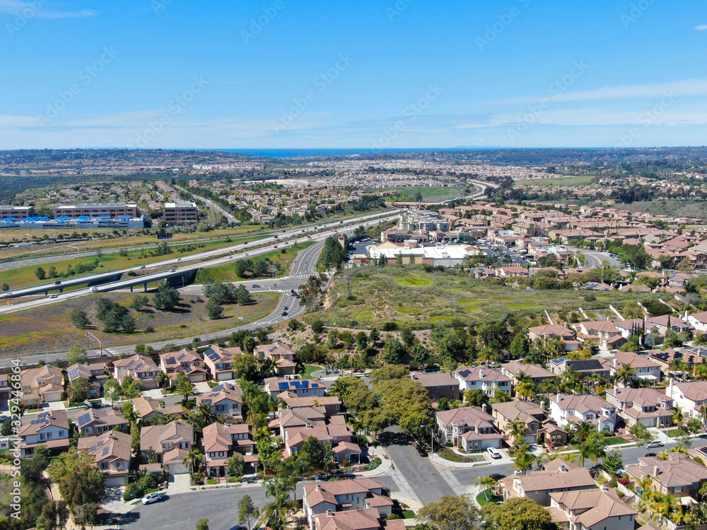 Aerial view of residential subdivision house during sunny day in Torrey Higlands, San Diego, California, USA