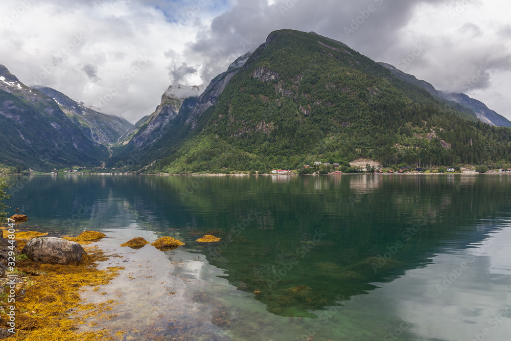 Beautiful Norwegian landscape. view of the fjords. Norway ideal fjord reflection in clear water. selective focus