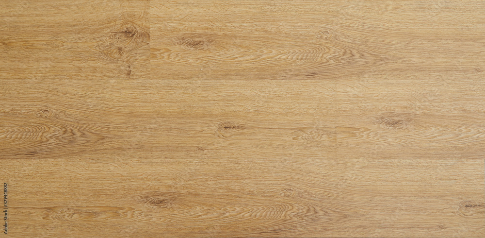 Fototapeta premium Wooden natural texture. New parquet blank. Wooden laminate floor boards background image. Home decor.