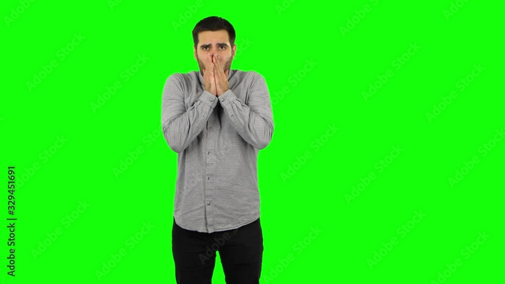 Brunette guy froze and trying to keep warm. Green screen Brunette guy froze and trying to keep warm. Green screen