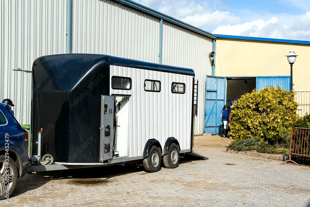 horse vehicle . Carriage for horses . Auto trailer for transportation of horses . transportation livestock .