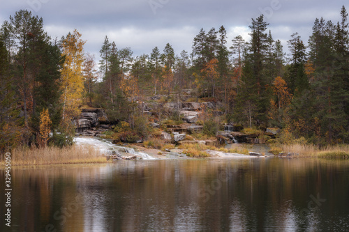 Fototapeta Naklejka Na Ścianę i Meble -  Forsaleden waterfalls in autumn colors, Sweden