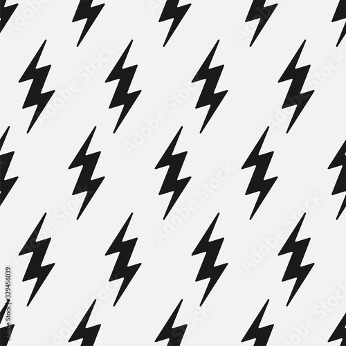 Vector flash seamless pattern. Cartoon black and white design. Artistic endless thunderbolt background