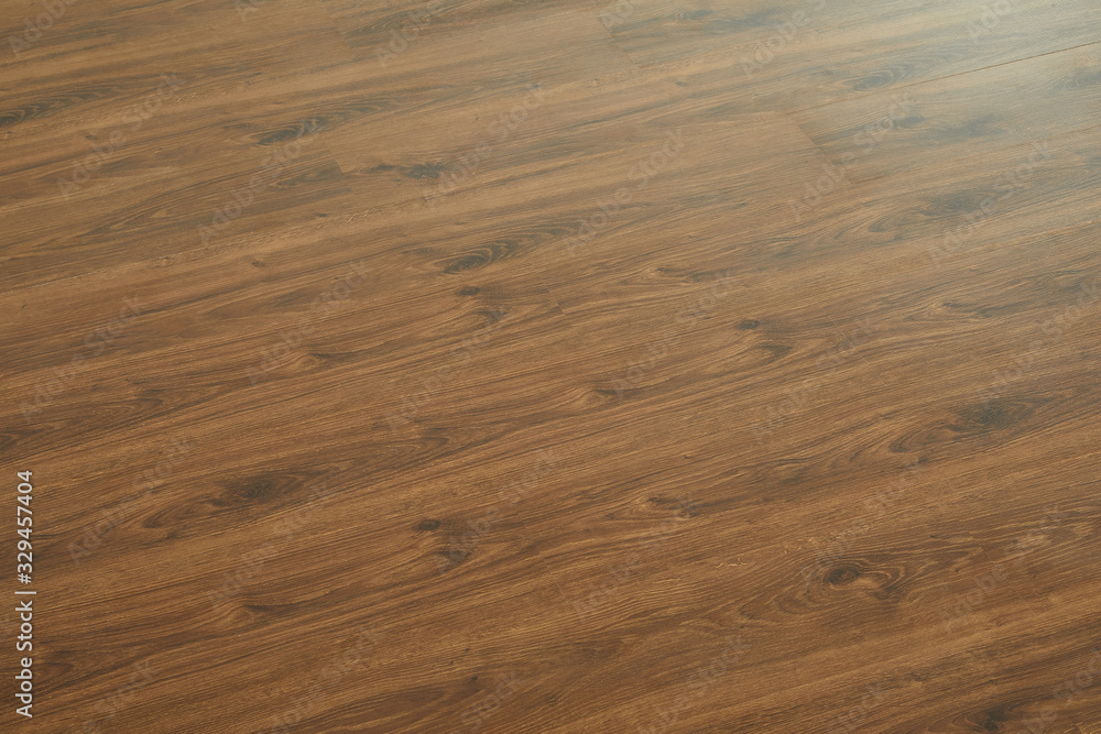 Fototapeta premium Wooden natural texture. New parquet blank. Wooden laminate floor boards background image. Home decor.