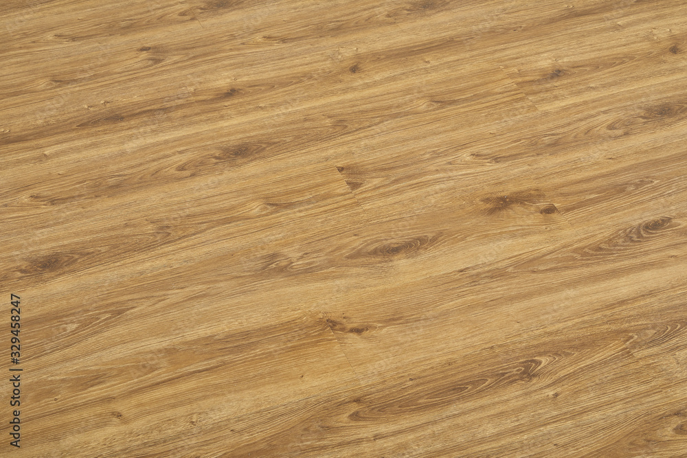 Fototapeta premium Wooden natural texture. New parquet blank. Wooden laminate floor boards background image. Home decor.