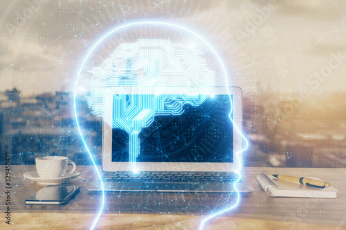 Multi exposure of work space with computer and human brain hologram. Brainstorm concept.
