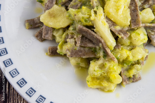 Pizzoccheri, typical dish of Valtellina cuisine, Italy photo