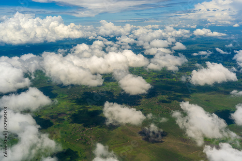 Flying above the earth and above the clouds in territory of Tanzania, Africa © OlegD