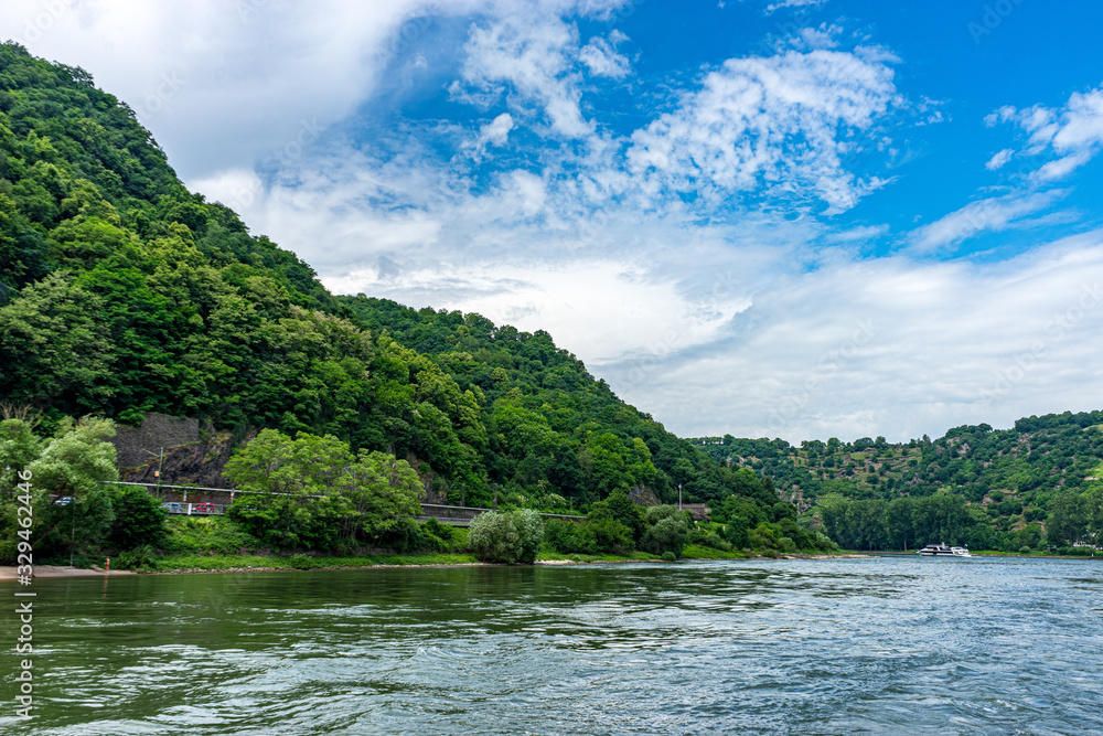 Germany, Rhine Romantic Cruise, Kelani River, a large body of water surrounded by trees with Kelani River in the background