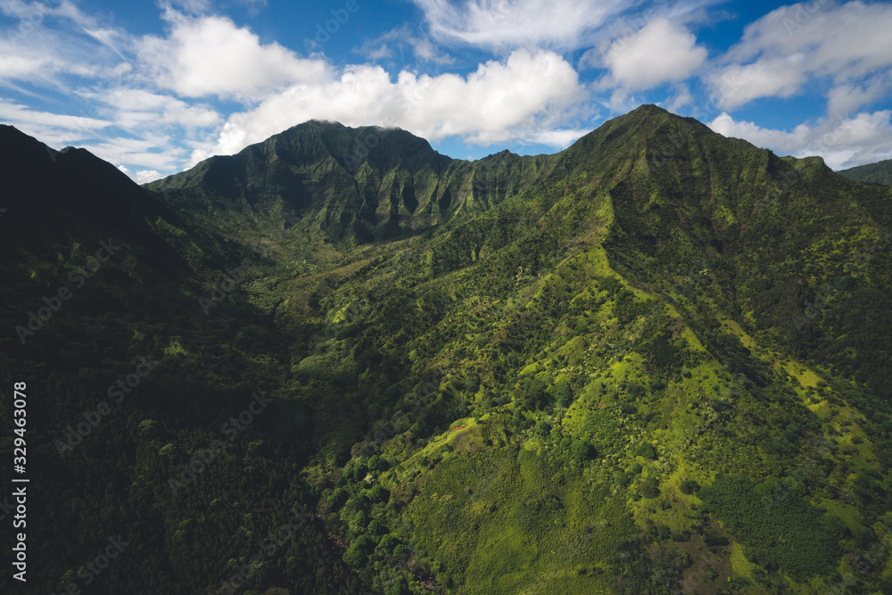 Aerial View of Kauai Landscape in Hawaii with Rugged Mountains and Lush Forests