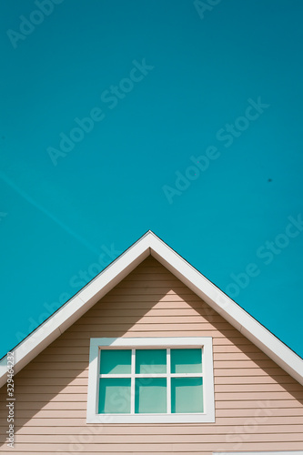 house on blue sky background