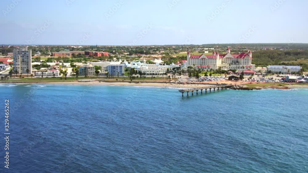 Shark Rock Pier and Hobie Beach in Summerstrand, smooth aerial push in camera movement reveals wide beachfront landscape in Port Elizabeth Shark Rock Pier and Hobie Beach in Summerstrand, smooth aerial push in camera movement reveals wide beachfront landscape in Port Elizabeth