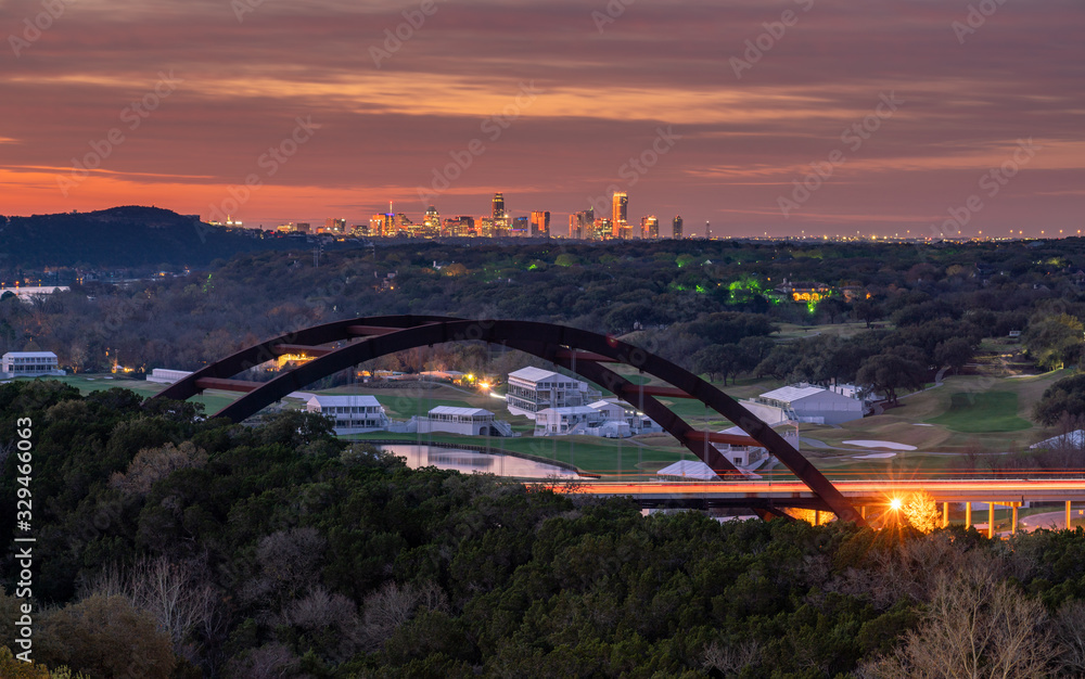 Early Sunrise View of the Light up Austin Skyline With the 360 Bridge in the Foreground