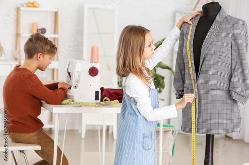 Cute little tailors working...