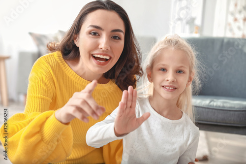 Young woman and her little ...