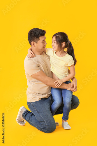Happy Asian man with his li...