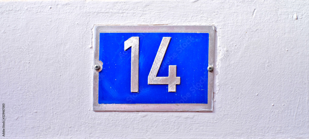 Numer 14, fourteen, blue metalic plate on a horizontal strip. Numer 14, fourteen, blue metalic plate on a horizontal strip.