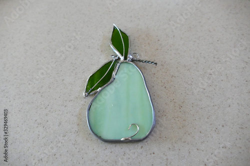 Fruit and flowers in stained glass signal spring. 