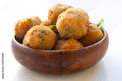 Deep Fried Tomato Sauce Risotto Balls with basil