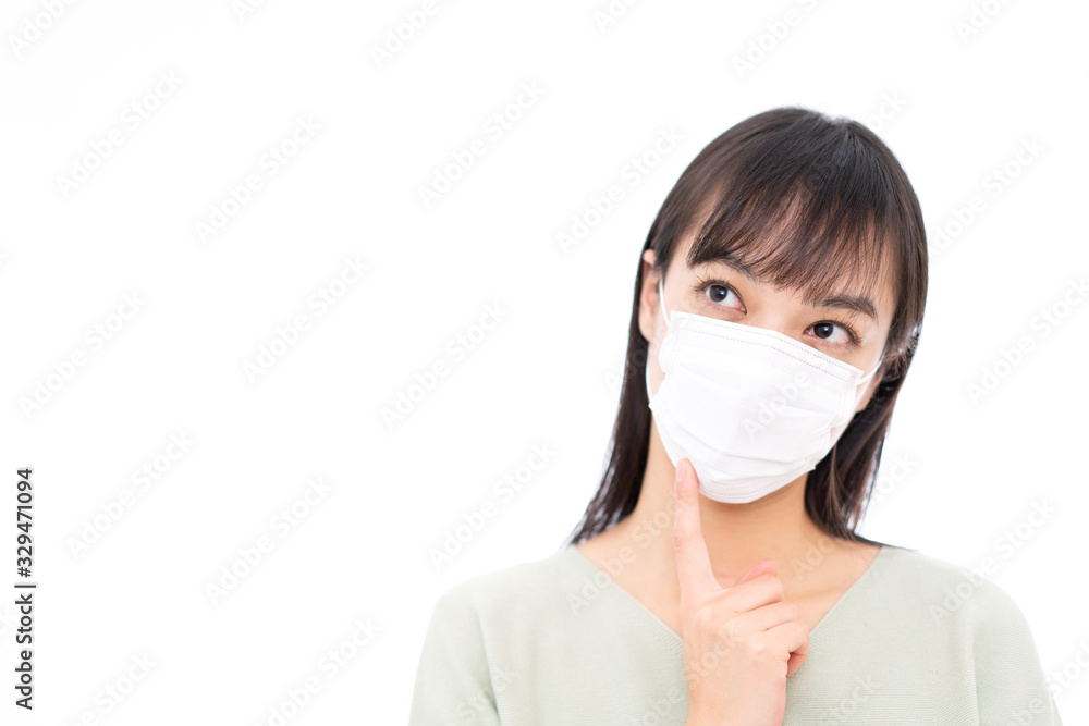 考えるマスクをした女性 考えるマスクをした女性