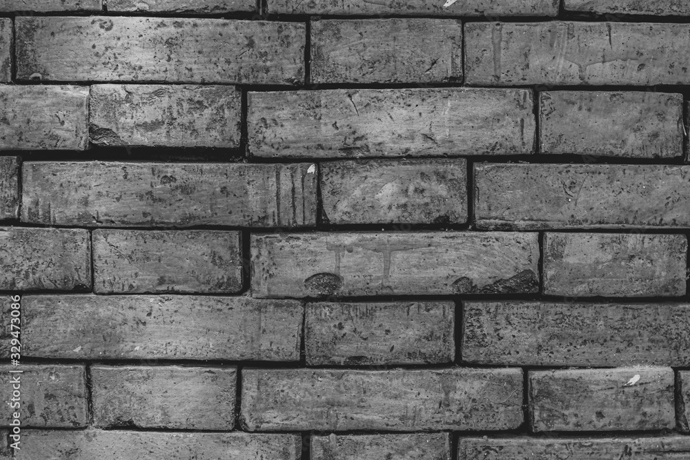 Fototapeta premium Black and white brick wall. background