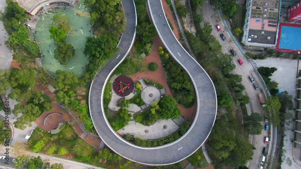 Po Kong Village Road Park Elevated Cycling Track and Skatepark in downtown Hong Kong, High altitude aerial footage. Po Kong Village Road Park Elevated Cycling Track and Skatepark in downtown Hong Kong, High altitude aerial footage.