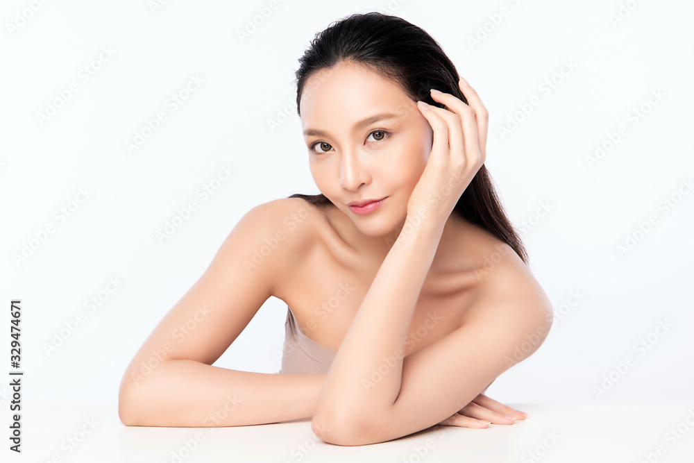 Beautiful Young Asian Woman with Clean Fresh Skin. Face care, Facial treatment, Cosmetology, beauty and healthy skin and cosmetic concept .woman beauty skin isolated on white background Beautiful Young Asian Woman with Clean Fresh Skin. Face care, Facial treatment, Cosmetology, beauty and healthy skin and cosmetic concept .woman beauty skin isolated on white background