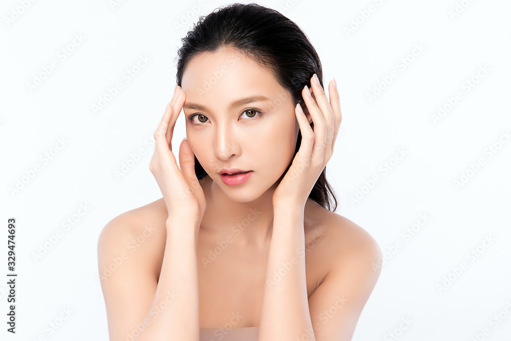 Beautiful Young Asian Woman with Clean Fresh Skin. Face care, Facial treatment, Cosmetology, beauty and healthy skin and cosmetic concept .woman beauty skin isolated on white background Beautiful Young Asian Woman with Clean Fresh Skin. Face care, Facial treatment, Cosmetology, beauty and healthy skin and cosmetic concept .woman beauty skin isolated on white background