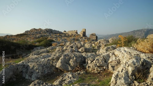 Rocky hilltop of Feraklos Castle, Rhodes, Greece photo