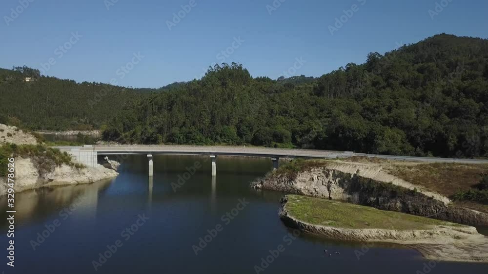 Drone shot of a bridge and a river. Drone shot of a bridge and a river.