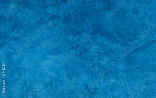 Beautiful Abstract Grunge Decorative Blue Wall Background. © detshana
