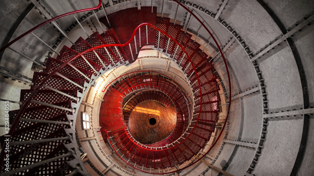 Staircase inside the lighthouse white red from the top down Staircase inside the lighthouse white red from the top down