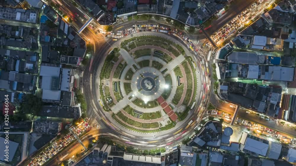 Hyperlapse timelapse of night city traffic on 4-way stop street intersection circle roundabout in bangkok, thailand. 4K UHD horizontal aerial view. Hyperlapse timelapse of night city traffic on 4-way stop street intersection circle roundabout in bangkok, thailand. 4K UHD horizontal aerial view.
