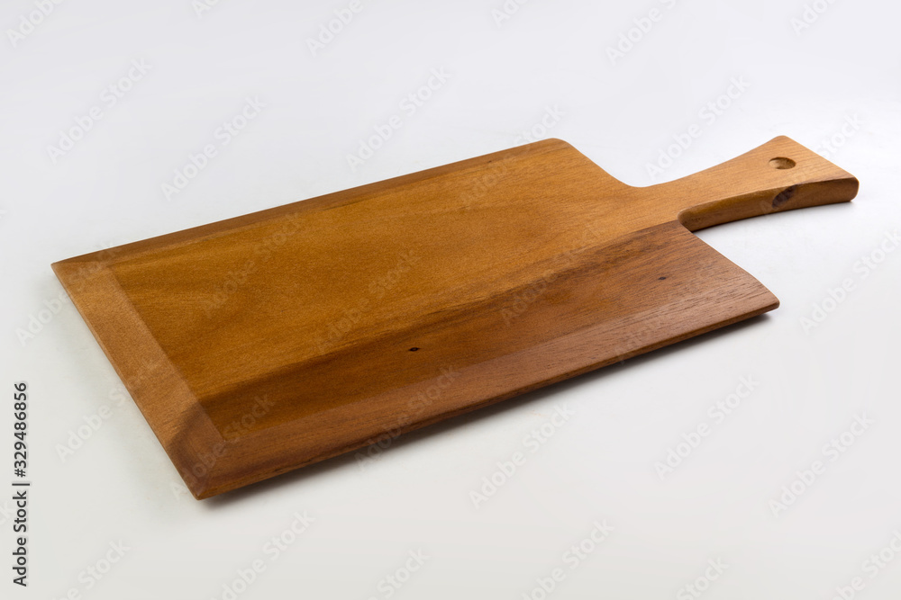 Wooden cutting board isolated on a white background