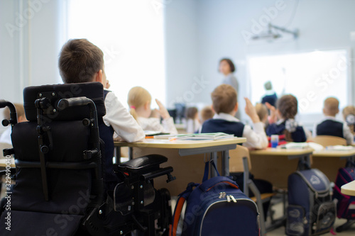 A disabled student in a wheelchair in primary school.