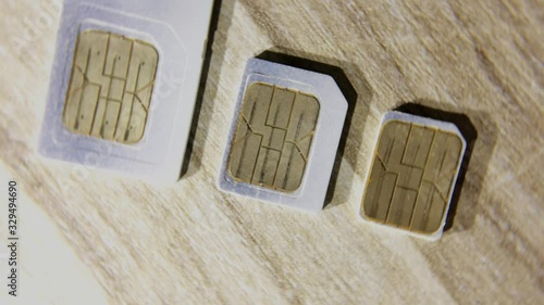 Simcard, mini Simcard, micro Simcard macro shot Rotating Turning