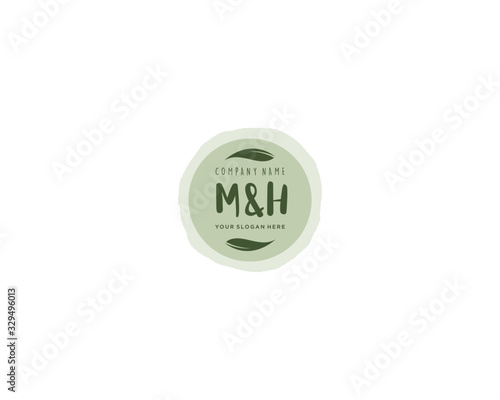 Letter MH handwrititing logo with a beautiful template