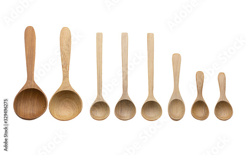 Handcraft wooden spoon or handmade wooden spoon isolated on white background. Eco kitchen utensil concepts. Top view.