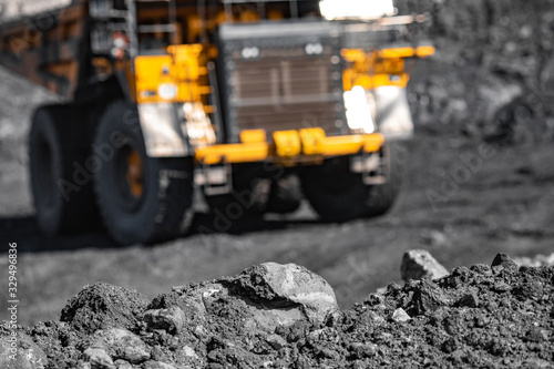 Big yellow mining truck for coal move. Open pit mine industry